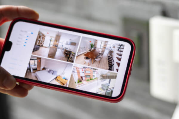 Home security camera feeds on a phone app in Dallas