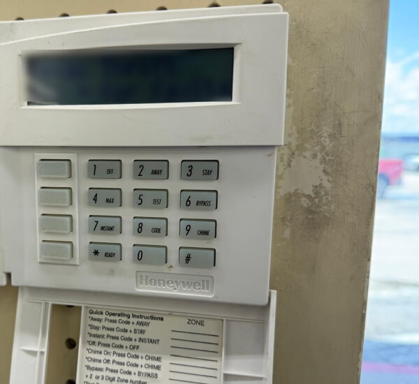 irving-commercial-alarm-system-keypad-business-img Commercial alarm system keypad mounted at an Irving business